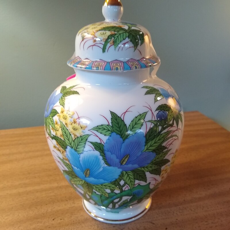 Japan Peking East Ginger

Vintage made in Japan Peking East ginger jar with colors of blue green and yellow on a white background.

 Size: 8 In Tall