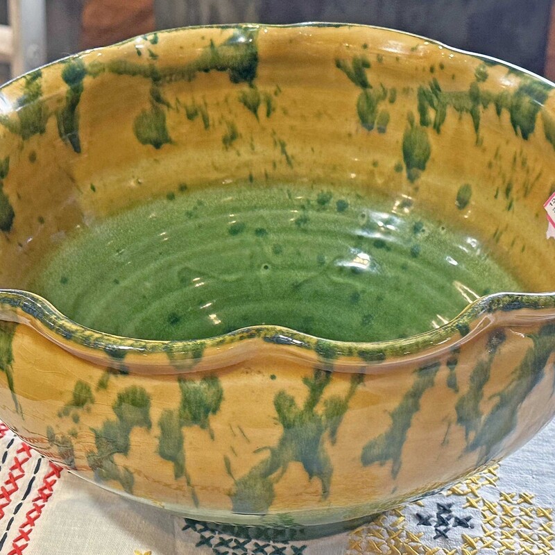 Green/Yellow Bowl From
Size: 15 X 6
Made in Italy, this bowl is deep and just beautiful!
Braided pottery handles and curved edges and so many ideas of what you could do with this.  WOW!