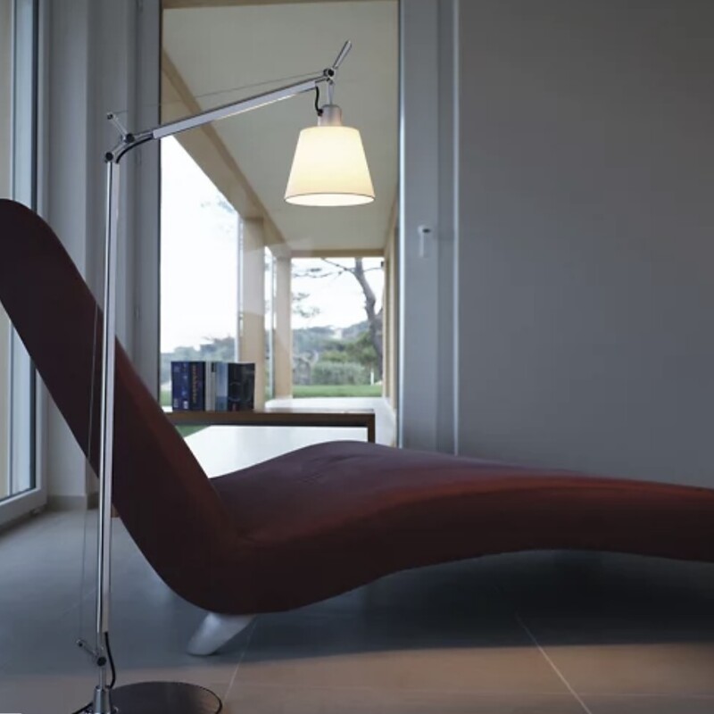 Tolomeo Floor Lamp<br />
<br />
Dimensions:<br />
Arm: Extension Adjustable From 25, Adjustable To 34.25<br />
Shade: Height 5.31, Diameter 7<br />
<br />
Designed by Michele De Lucchi and Giancarlo Fassina. The Tolomeo with Shade Reading Floor Lamp from Artemide draws on the appearance of the original desk lamp, adapting it into a stylish floor lamp to read by. It couples the sleek adjustability that’s the trademark of the Tolomeo family with a convenient shade that adds visual spice. The floor lamp features fully adjustable, articulated arms in brilliantly polished aluminum, lightweight for easy movement yet also extremely durable.