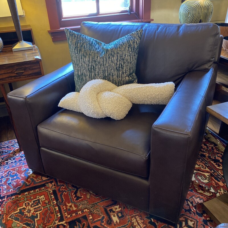 Crate & Barrel Axis<br />
<br />
Full Size Sleeper Sofa - 76Wx43Dx32H<br />
Swivel Chair - 40Wx43Dx32H<br />
Club Chair - 40Wx43Dx32H<br />
<br />
Bring Axis home and watch life revolve around it. Upholstered in top-grain, full-aniline dyed leather that gains character over time, this chair offers laid-back comfort in family rooms and casual living rooms.<br />
Track arms create a clean look, and low back cushions and deep seats encourage lounging. Not surprisingly, Axis has been a customer favorite for more than a decade. Axis Leather Chair is a Crate and Barrel exclusive.