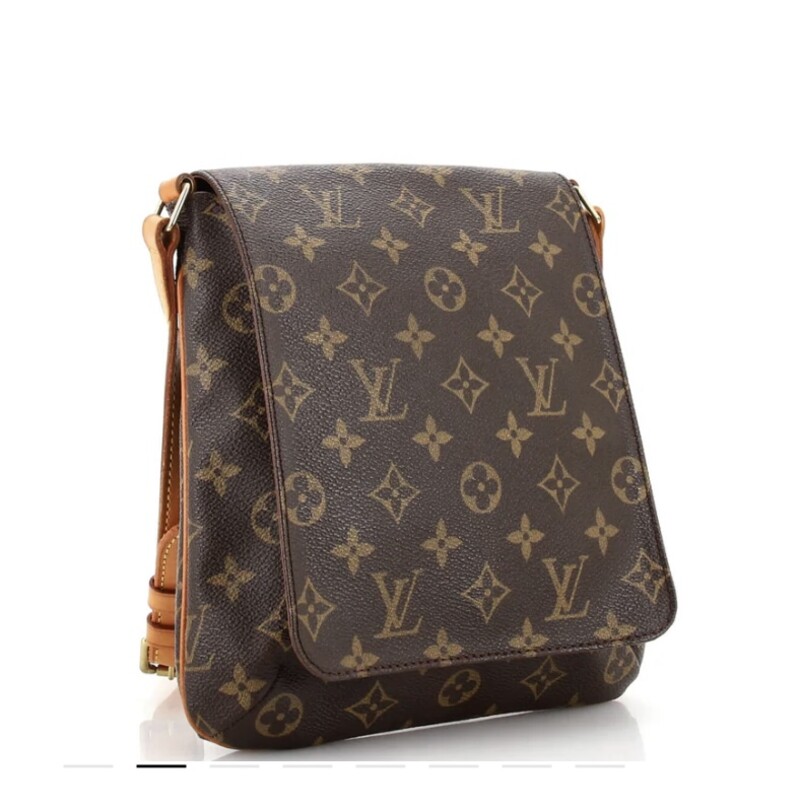 LOUIS VUITTON
Monogram Musette Salsa PM
This is an authentic LOUIS VUITTON Monogram Musette Salsa PM. This shoulder bag is crafted of Louis Vuitton monogram on coated canvas in brown. This bag features an adjustable shoulder strap made of vachetta leather, brass hardware, and opens to a microfiber interior with a patch pocket.  Alcantara Lining & Single Interior Pocket with a Snap Closure at Front.

Base length: 8.5 in
Height: 9.5 in
Width: 1.75 in
Drop: 10.75 in

SD0041 meaning this bag was manufactured in France in April 2001

This bag is in good condition.  wear to the leather but no flaws, marks or tears in the coated canvas.  The interior is in great condition.