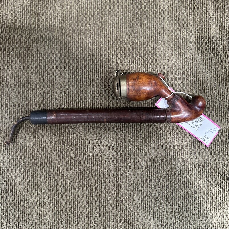 Czech Hand Carved Pipe
Size 10 x 3
Antique wooden smoking pipe with Czechoslovak stamped on the bowl.  It has brass fillings on the bowl. Quite the addition to any collectors collection!!