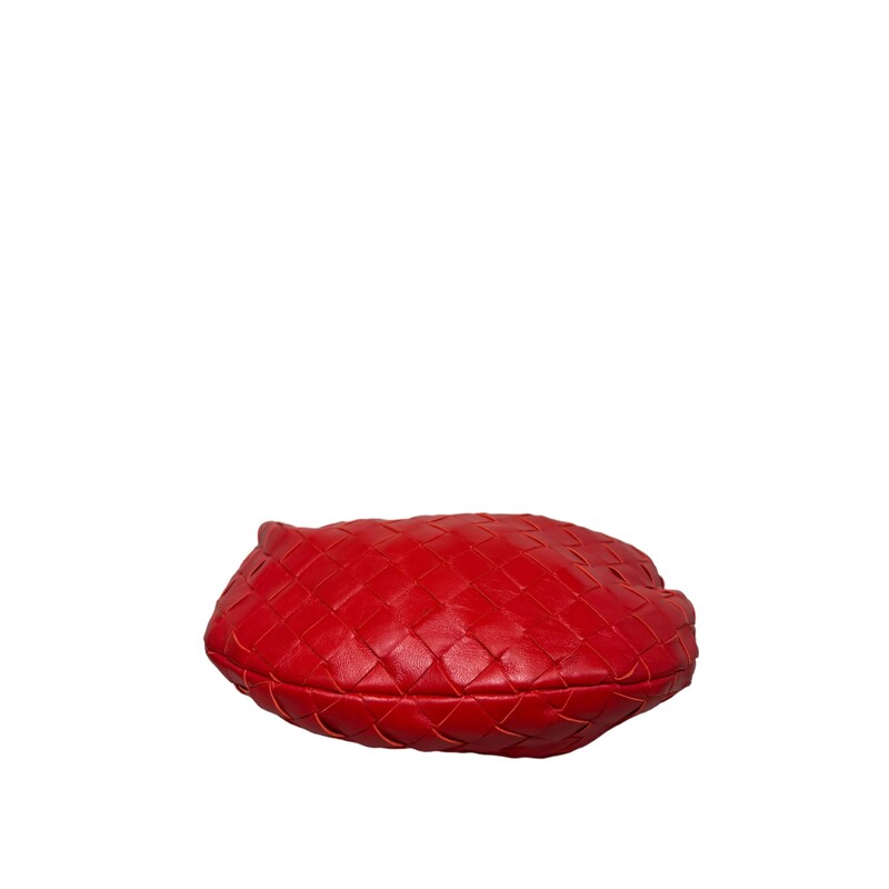 Bottega Veneta's mini Jodie bag is crafted of the house's signature Intrecciato leather.<br />
Top handle<br />
Top-zip closure<br />
Leather<br />
Made in Italy<br />
Dimensions: 11W x 9H x 3D<br />
Top handle: about 4 drop