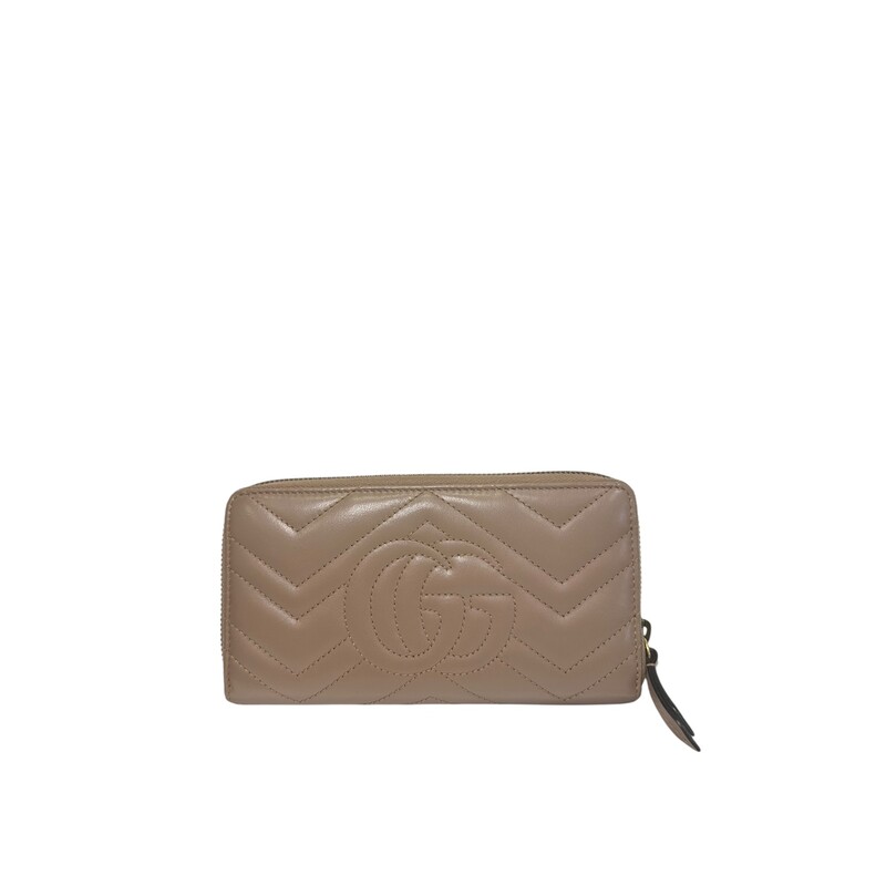 The GG Marmont collection is defined by the emblematic Double G hardware—a contemporary take on a Gucci archival belt buckle from the '70s that has become a hallmark of the House. The zip-around wallet is crafted in soft matelassé leather that coordinates with bags of the collection.<br />
<br />
Brown  matelassé chevron leather with GG on the back<br />
Antique gold-toned hardware<br />
Double G<br />
12 card slots and three bill compartments<br />
Zip coin pocket<br />
Zip around closure<br />
Dimensions 7.4W x 4H x .7D<br />
Made in Italy<br />
Code:443123 525040