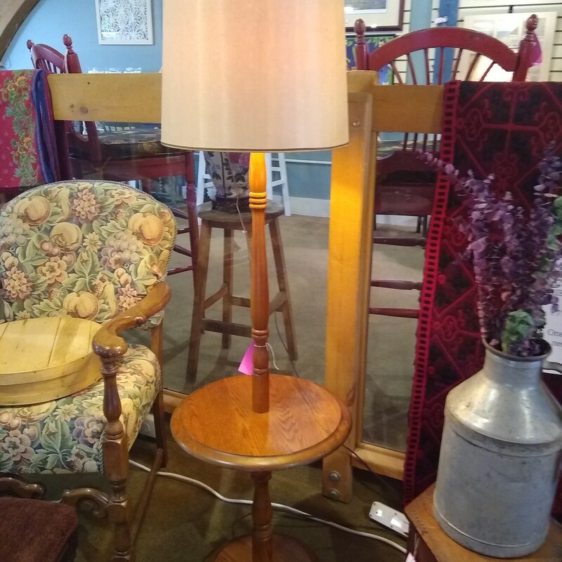 Vtg Wood Floor LampTable

Vintage 1970s wooden floor lamp with round table and a round base.

Size: 15 in diam table X 57 in tall