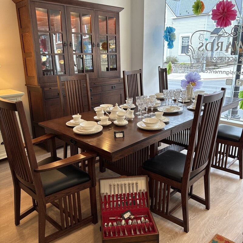 Mission  Arts & Crafts Dining Set
By Le Meuble Villageois
Made in Quebec. Canada
Brown
Set Of 8
Table & 2 leaves 66 L X 30 W  In Leaves 18 In 102 In Total
2 Arm Chairs 27 W X 21D X 45 H In
4 Side Chairs  20 W X 22 D X 45 H In
China Cabinet, Lighted  66 W X 19 D X 84 H In
Made Of Oak and Cedar