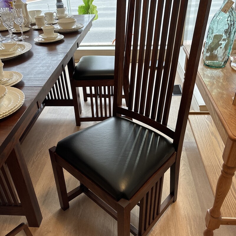 Mission  Arts & Crafts Dining Set<br />
By Le Meuble Villageois<br />
Made in Quebec. Canada<br />
Brown<br />
Set Of 8<br />
Table & 2 leaves 66 L X 30 W  In Leaves 18 In 102 In Total<br />
2 Arm Chairs 27 W X 21D X 45 H In<br />
4 Side Chairs  20 W X 22 D X 45 H In<br />
China Cabinet, Lighted  66 W X 19 D X 84 H In<br />
Made Of Oak and Cedar