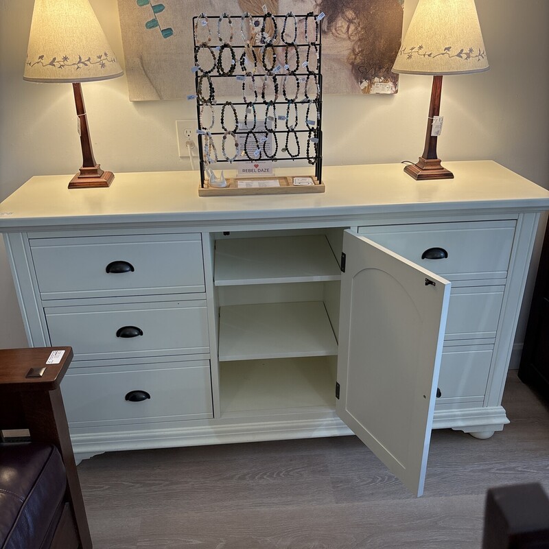 Dresser / Cabinet<br />
By Ashley Funiture<br />
Cream<br />
Size: 63 W X 17 D X 36 H In<br />
6 Drawer and Cabinet