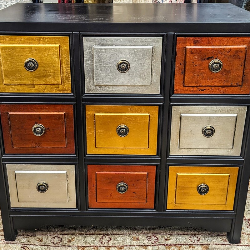 9 Drawer Wood Chest
Multi Color Drawers Black Wood
Size: 37x18x34H
Deep Drawers
Matching Chest Sold Separately