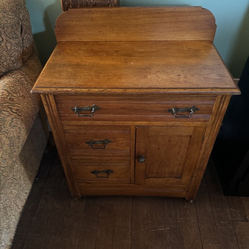 Utility/Washstand
1890-1910 East Lake LIKE 3 drawere cabinet, Backsplash, Oak & Walnut Wood, ALL Original, with Wooden Castors
37 Inches Wide, 16 Inches Deep, 35 Inches Tall