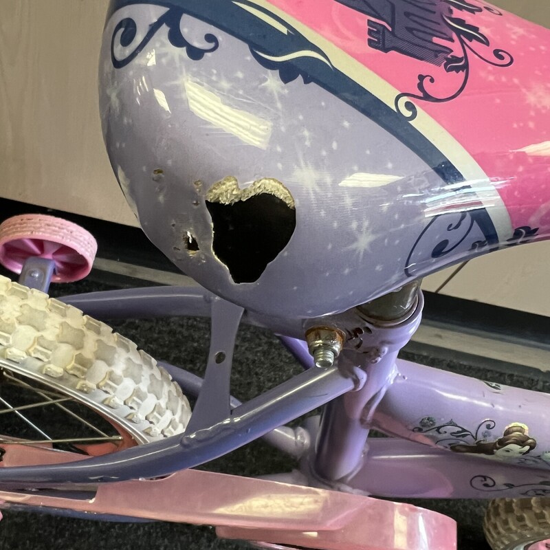 Disney Princess Bicycle, Pink, Size: 14 Inch<br />
Suits 3-6 year olds.<br />
Includes training wheels.<br />
Tassled removed<br />
Small hole on seat