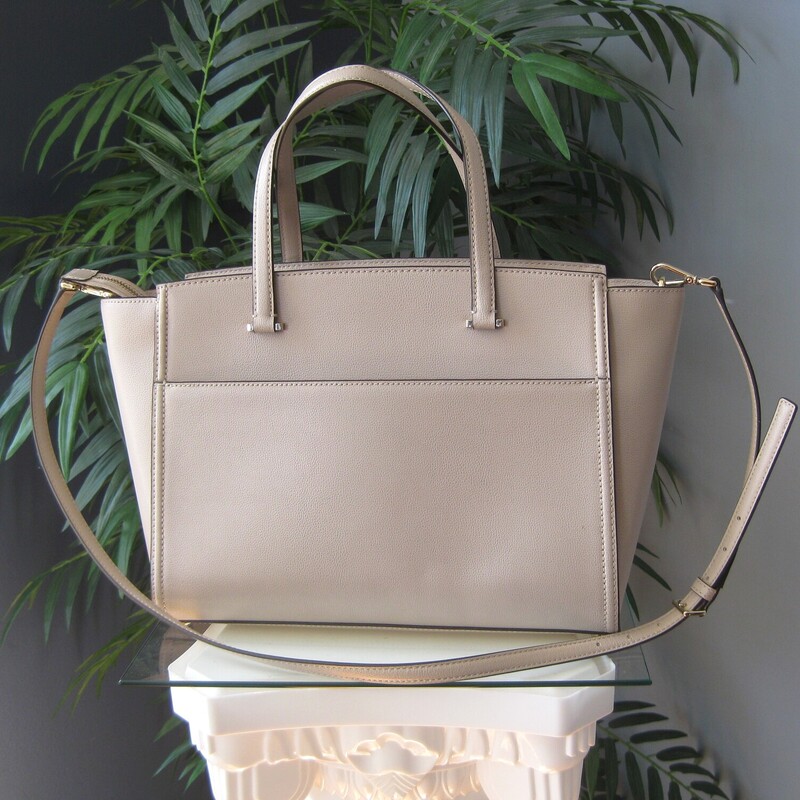 Kate Spade Leather Tote, Blush, Size: None<br />
rofessional looking bag for summer by kate spade new york<br />
Structured beige leather with gold hardware<br />
Leather straps and detachable and adjustable crossbody strap<br />
<br />
<br />
inside it has 1 zippered pocket and 2 slip pockets<br />
logo lining<br />
13 wide at the top, 16.5 wide at the bottom<br />
10 tall<br />
5.5 deep at the bottom<br />
Handle drop: 6.5<br />
Strap drop: 16 minimum, 21.75 maximum<br />
<br />
Excellent condition, some light marks on the outside super clean inside.<br />
<br />
thanks for looking!<br />
#71950