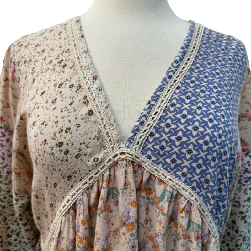 Fashion Fuse Dress<br />
Beautiful Boho Style<br />
Floral Print<br />
Crochet Trim<br />
Bell Sleeves<br />
Cream, Navy, Purple, Rose and Olive<br />
Size: Medium