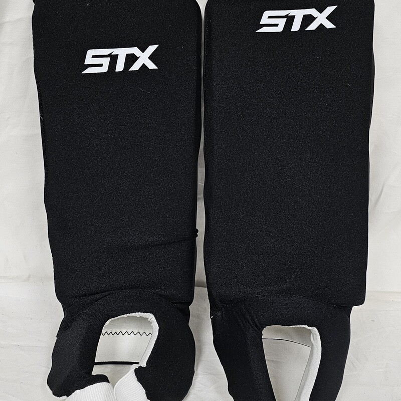 Pre-owned STX Reversible Field Hockey Shin Guards, Black & White, Size: 10in