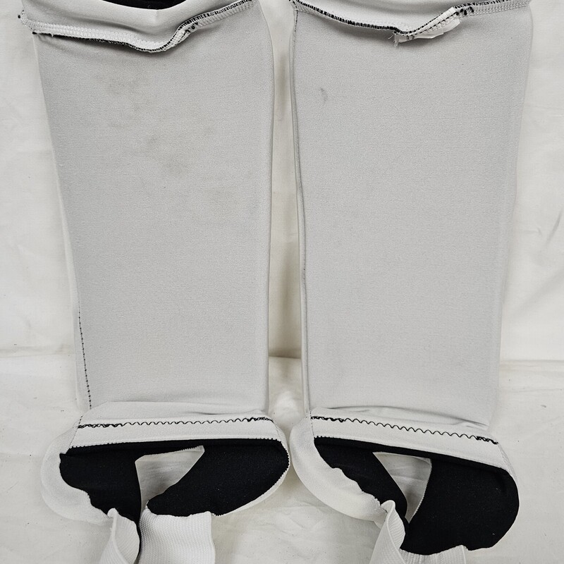 Pre-owned STX Reversible Field Hockey Shin Guards, Black & White, Size: 10in