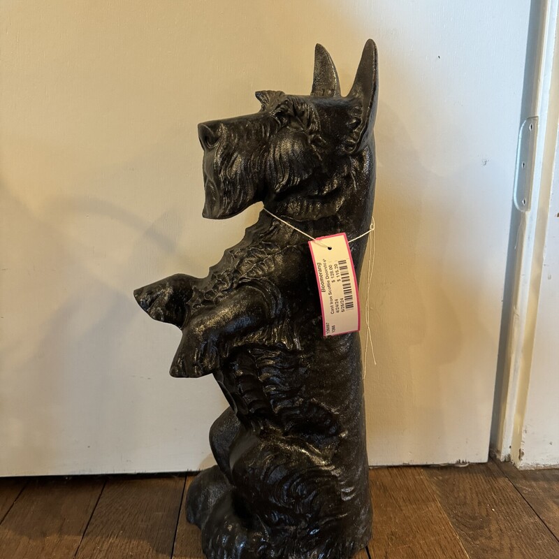 Cast Iron Scottie Doorsto,
 Size: 8 x 17
Realistically cast and modeled of a Scottie standing on its hind legs.
This one doesnt bark or ask to go outside!