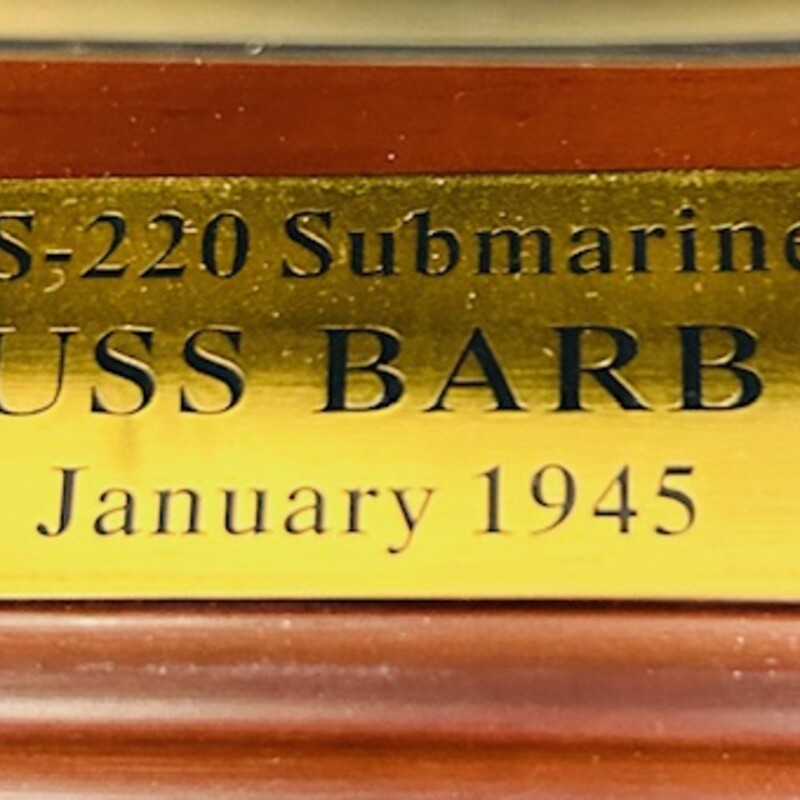 Danbury Mint USS Barb
Black Grey on Brown Base Removable Acrylic Top Size: 15x4x6H
In nice condition desk top model 1:300 scale  USS Barb WW2 Gato Class Submarine long range , habitability , self - sufficiency and powerful armaments proved decisive forces in defeating Japan . In the pacific theatre she compiled one of the most outstanding submarine records of WW2 in sinking 17 enemy ships totaling 96,628 tons. COA from Danbury  Mint