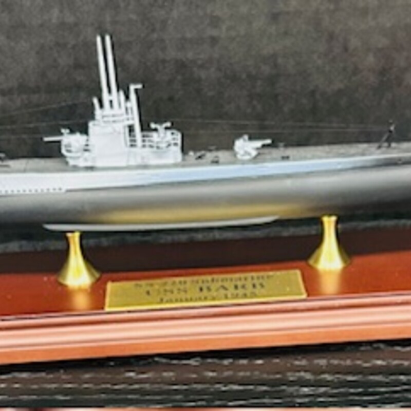 Danbury Mint USS Barb
Black Grey on Brown Base Removable Acrylic Top Size: 15x4x6H
In nice condition desk top model 1:300 scale  USS Barb WW2 Gato Class Submarine long range , habitability , self - sufficiency and powerful armaments proved decisive forces in defeating Japan . In the pacific theatre she compiled one of the most outstanding submarine records of WW2 in sinking 17 enemy ships totaling 96,628 tons. COA from Danbury  Mint