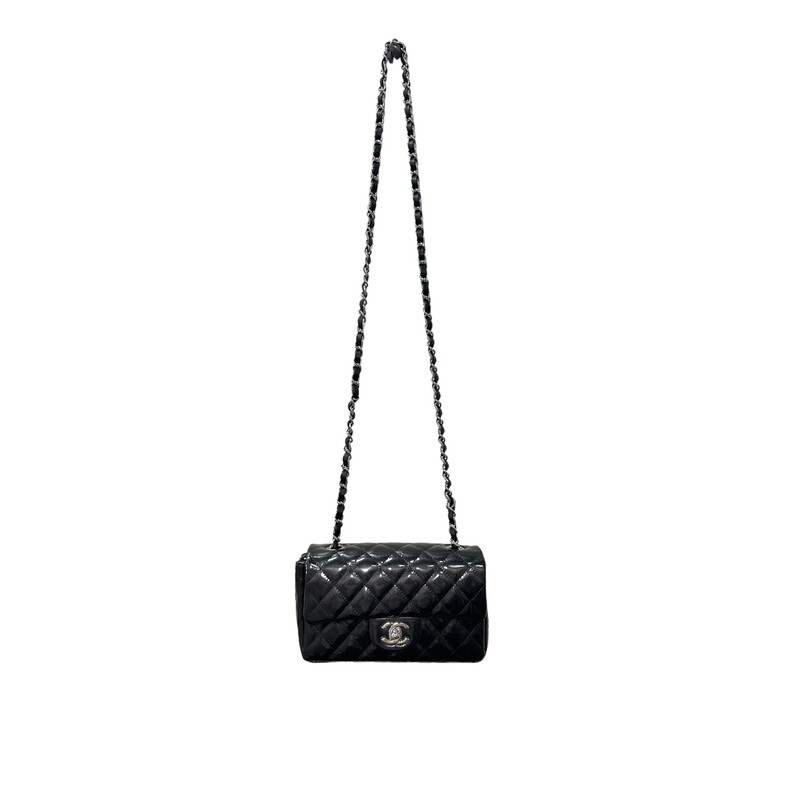 Chanel Flap Metallic, Silver, Size: Mini<br />
<br />
Dimensions:<br />
Length: 7.75 in<br />
Height: 4.75 in<br />
Width: 2.75 in<br />
Drop: 21.5 in<br />
<br />
This is an authentic Chanel Shaded Patent Calfskin Quilted Mini Rectangular Flap. This beautiful bag is made out of luxurious diamond quilted shiny patent leather. The bag features a cross body leather threaded gold chain link shoulder strap, a frontal flap and a gold Chanel CC turn lock. This opens to a matching leather interior with zipper and patch pockets.