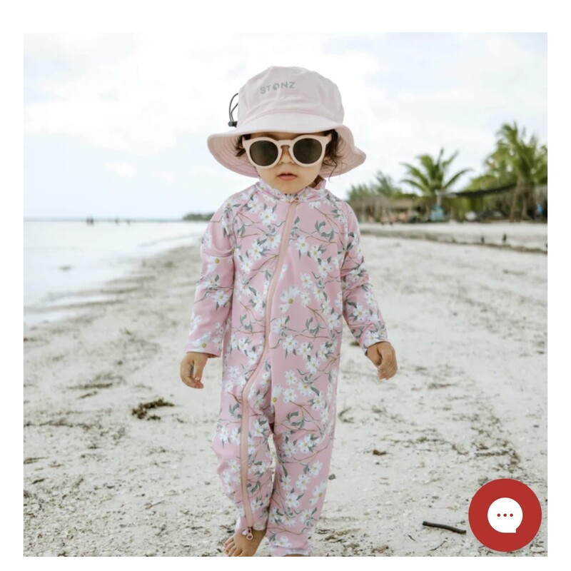 Stonz Sun Suit, Pacific Blossom, Size: 2Y<br />
<br />
This summer, skip the sunscreen hassle and keep your baby safe with our delightful sun suits. Crafted from non-toxic, tightly woven UPF 50+ fabric, this versatile bathing suit will quickly become a wardrobe essential. Thanks to the full-length zipper, diaper changes and potty breaks are a breeze!<br />
<br />
Offering full-body coverage, including the neck, in seconds, simply zip up their swimsuit and they're ready for fun in the sun. Perfect for any outing, whether it's the pool, beach, waterpark, or a picnic, our prints and colors stay vibrant wash after wash.<br />
<br />
Chemical-free UV protection that lasts: The tight-knit fabric is what keeps this sun suit effective. That means that no matter how many times you wash it, it’ll protect your little one from the harsh sun without exposing them to harmful substances.Easy bathroom breaks: Convenience is key with our two-way, full-length zipper, making bathroom breaks stress-free without the hassle of buttons.Good for swim and play: Transition seamlessly from playtime in the park to a dip in the pool with our lightweight, quick-drying fabric, eliminating the need for extra outfits.Designed for movement: our sun suits feature soft, stretchy fabric and breathable sides, allowing your child to play comfortably all day long without overheating. Plus, they're machine washable for easy upkeep, giving you one less thing to worry about this summer.