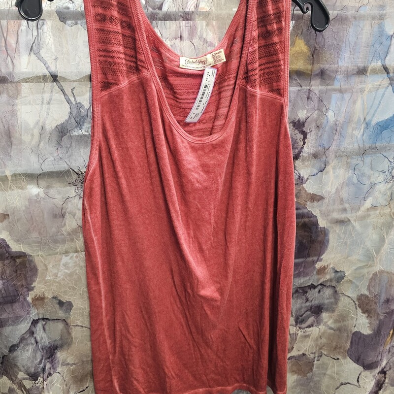 Distressed red tank with cute designed back panel.