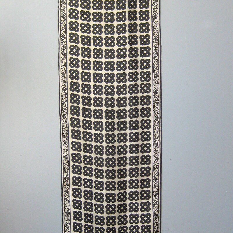 Simple black and white scarf with stylized celtic knots grid pattern<br />
Silk<br />
Excellent condition<br />
<br />
W: 11<br />
L: 41<br />
<br />
Thanks for looking!<br />
#65690