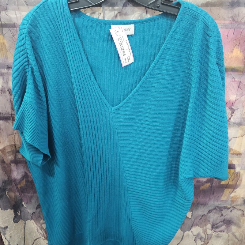 Great all year round, this short sleeve sweater is in a teal and lightweight and super soft.