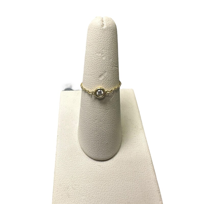 Tiffany By The Yard, 18K, Size: Size 8<br />
Tiffany round diamonds catch the light and make it dance. Ring in 18k gold with a round brilliant diamond. Carat weight .07.