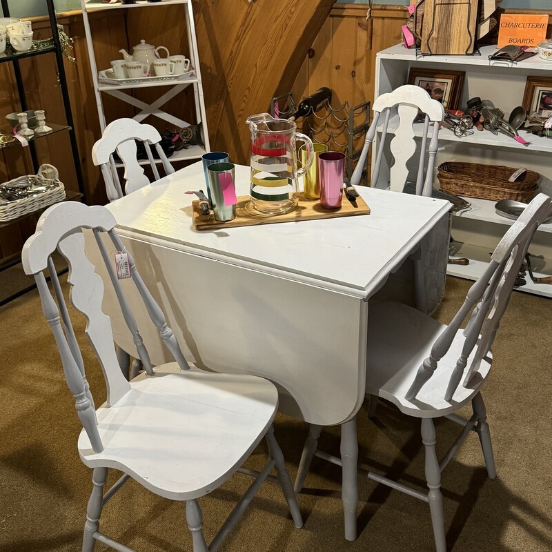 Whitet Drop Leaf Tble W/4 Chairs
 23 Wide (Closed),56 Inches (Open) 33 Inches Long 31Inches High