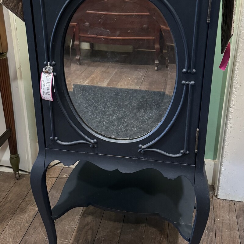 Blue Music Cabinet
Has a Shelf Inside, Mirror on Front
 14 Inches Wide 19 Long 36 InchesTall