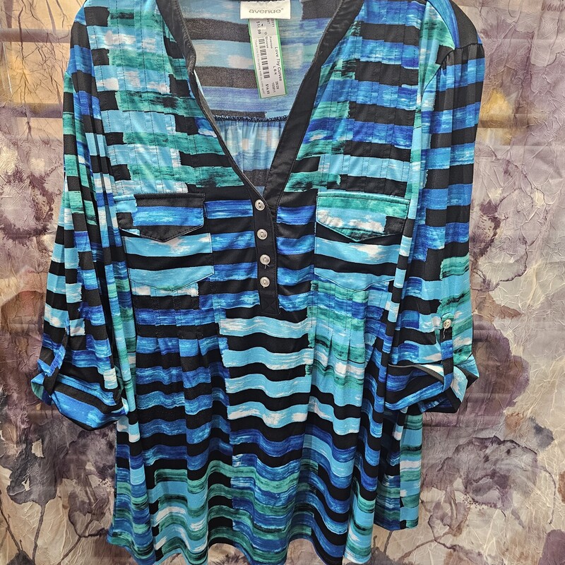 Beautiful blouse in black blue and teals that is half sleeve and perfect for the office or lunch with the girls.