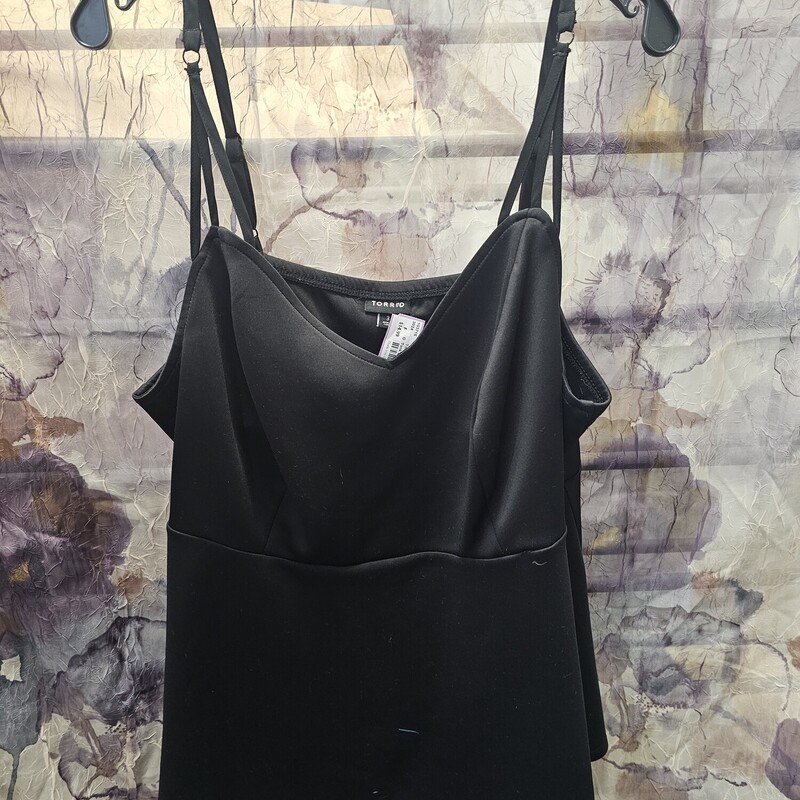 Adjustable straps and cinched waist make this black tank style blouse a show stopper. Super cute and va va va voom style.