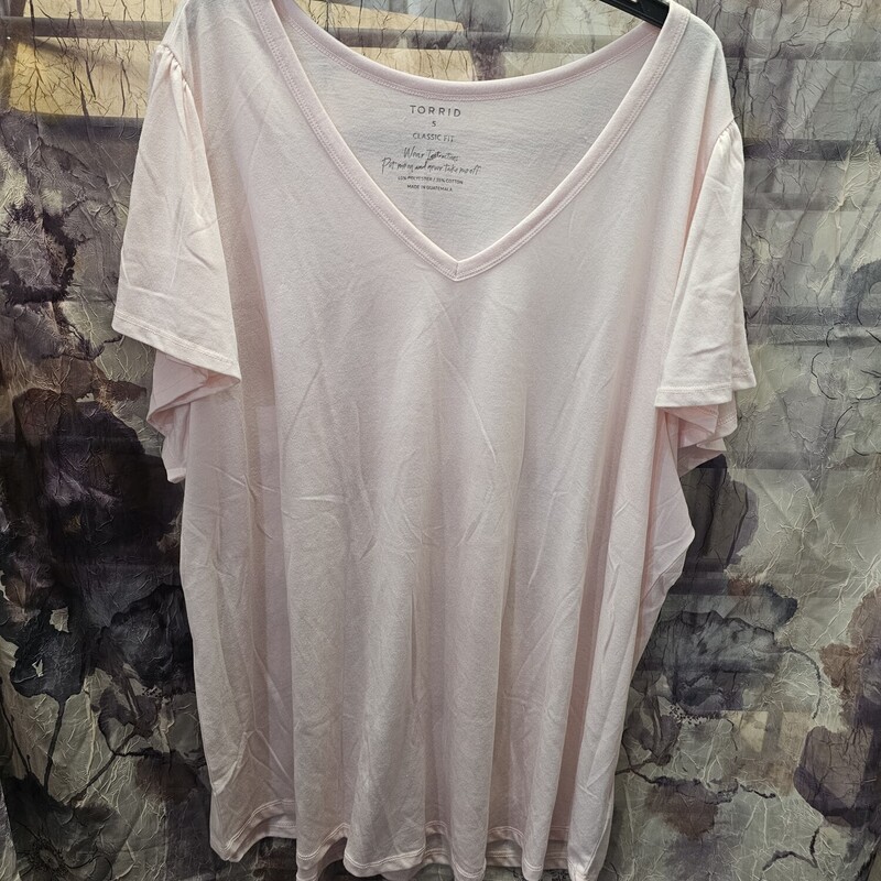 Brand new with tags, this tee is short flutter style sleeves and done in a soft pink.