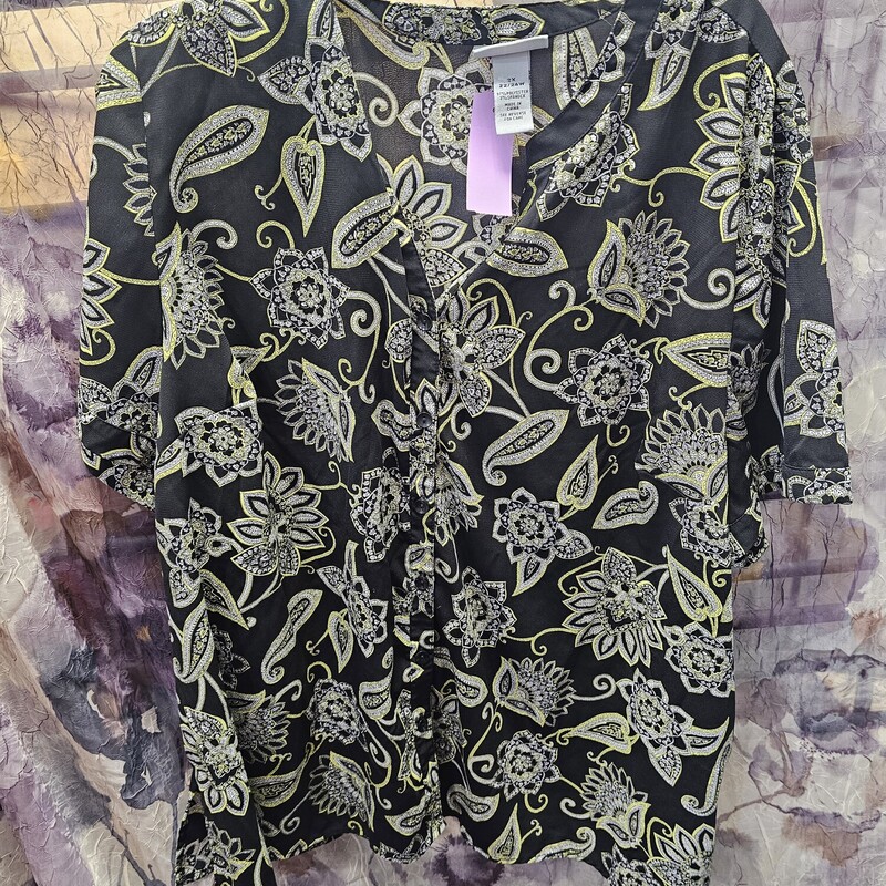 Short sleeve button up front blouse with black white and yellow print.