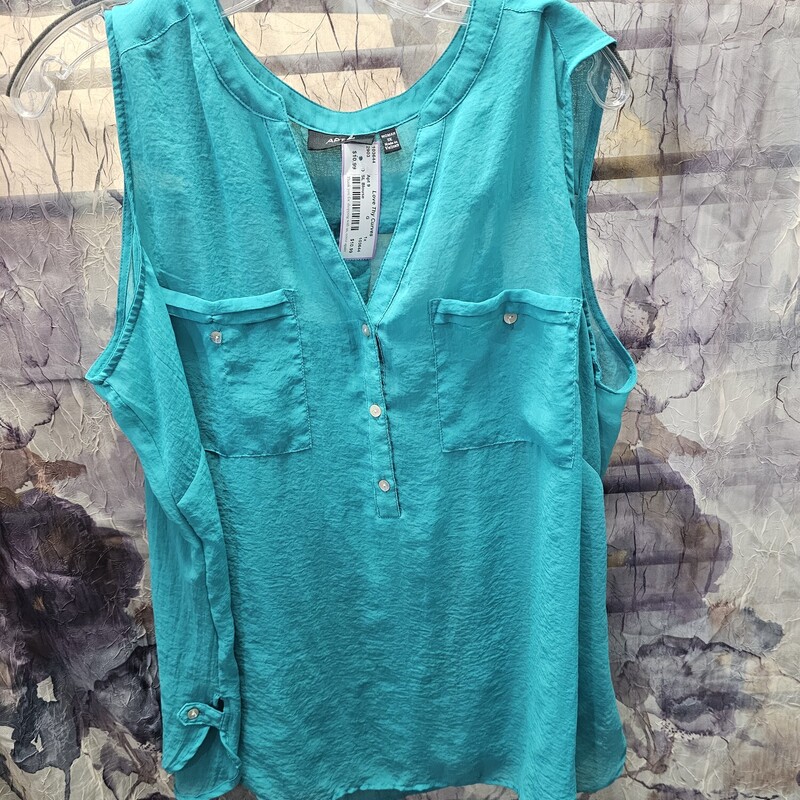 Somewhat sheer green sleeveless blouse with no collar style. Great for summer.