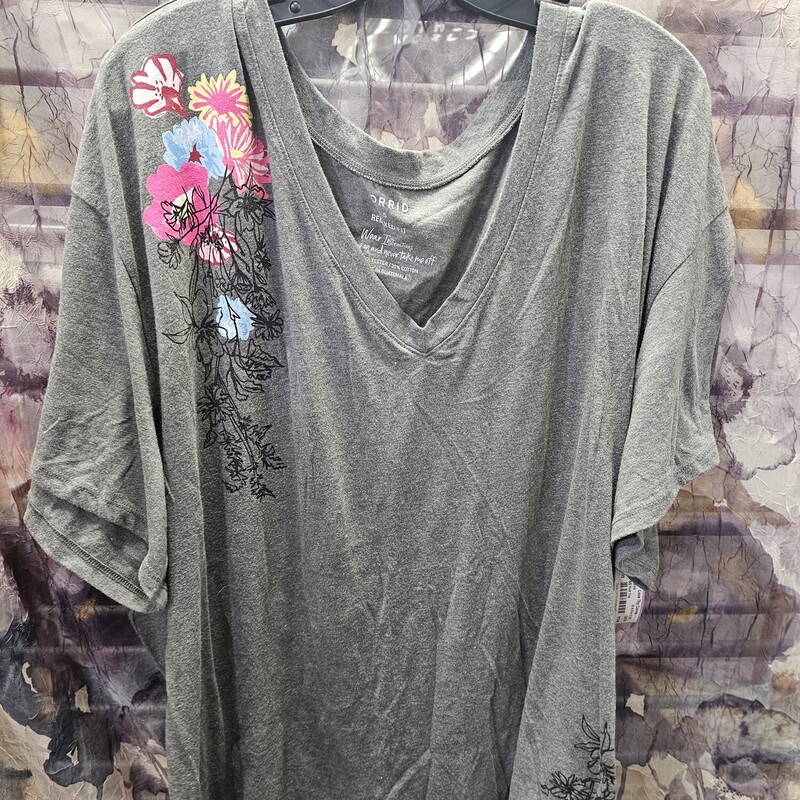 Cute short sleeve knit top in a baseball jersey cut with grey and white bodice and floral print.