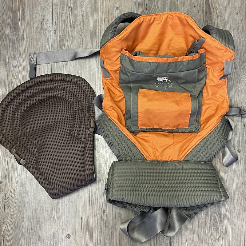 Onya Outback Infant to Toddler Baby Carrier, Orange, Size: Max 75lbs
Comes with Insert
From the streets of Ottawa to the hills of Gatineau Park, the Outback Baby Carrier by Onya Baby offers an innovative approach to the soft-structured carrier. Manufactured from robust rip-stop nylon on the exterior and stay-cool mesh lining on the interior, baby and parent will both stay comfortable on quick outings or long hikes.

The Outback Baby Carrier can be worn for front-pack carry, as a backpack, or even on the hip.

It includes a hidden, integrated seat designed to fit almost any chair – a perfect way to ensure baby has a seat should you stop at a restaurant without a high chair or booster seat.

The Outback Baby Carrier is machine washable, and boasts a combined carry load (child + cargo) of 34kg/75lbs. Various colours in stock – call for details.
