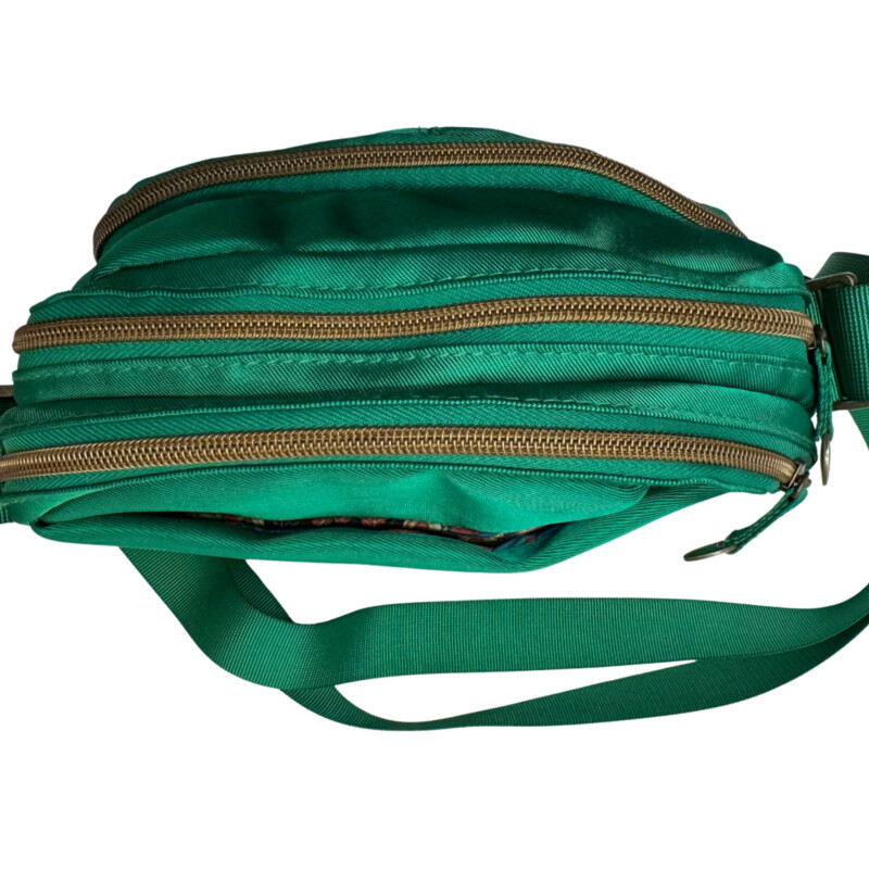 Travelon Crossbody<br />
Adorable Fun Pattern Inside<br />
Exterior Color:  Happy Green<br />
Perfect Bag for Summer!