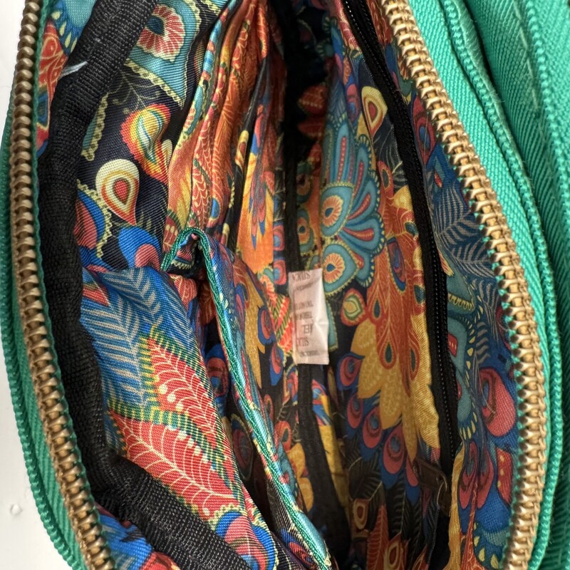 Travelon Crossbody
Adorable Fun Pattern Inside
Exterior Color:  Happy Green
Perfect Bag for Summer!