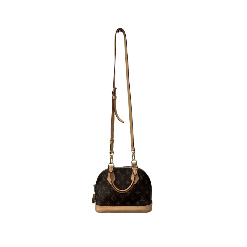 Louis Vuitton Alma BB Monogram Handbag

Size: BB

Dimensions:
9.3 x 6.9 x 4.5 inches
(length x Height x Width)

The Alma BB handbag traces its pedigree to an Art Deco original, introduced in 1934. Signature details impart a timeless elegance to this model crafted from iconic Monogram canvas: note the golden padlock and keys, two Toron handles and smart leather key bell. Fitted with a detachable and adjustable strap, this charming small bag is perfect for cross-body wear.