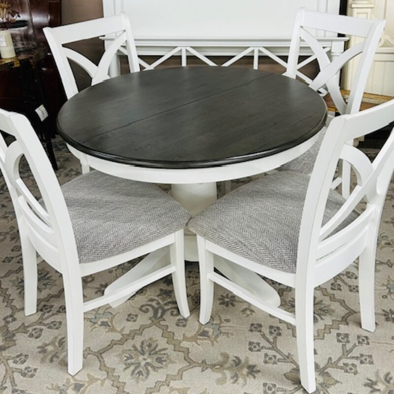 Round Wood Dining Set with 4 Chairs
White Gray
Table Size: 42 x 30H
Self-storing 18 inch leaf included
Chair Size: 22 x 20 x 39H
