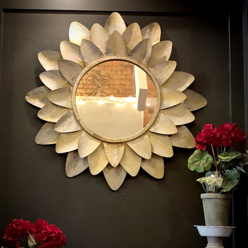 Sunflower Mirror
25 x 25
It's not just a mirror; it's a botanical masterpiece! Imagine a blooming flower frozen in time, its petals elegantly unfurling around the reflective surface like a graceful dance. This mirror isn't just about practicality; it's a statement piece that adds a touch of nature-inspired glamour to any space. Hang it in your entryway for a stylish greeting, or in your bedroom for a touch of whimsical romance every time you catch your reflection. With this mirror, you're not just reflecting light; you're reflecting your impeccable taste in décor!