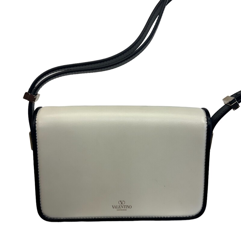 Valentino Letter Shoulder, Cream, Size: 2023<br />
<br />
Dimensions:<br />
Height 7in<br />
Width 9.5in<br />
Adjustable Strap<br />
<br />
Note: Scratch on the front on the bag<br />
<br />
This Valentino Garavani shoulder bag honours the brand's iconic VLogo Signature with a gleaming gold-tone plaque at the centre of the leather construction. A versatile design, it can be worn in many ways to its adjustable top handle.