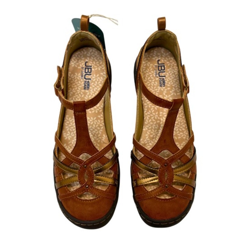 New JBU Dove Sandals<br />
Textile and synthetic upper with airy cutout detailing.<br />
Adjustable hook-and-loop closure.<br />
T-strap to ensure a snug fit.<br />
Memory foam footbed for added comfort.<br />
Awarded Seal of Acceptance by APMA for promoting good foot health.<br />
Brown, Copper, and Tan<br />
Size: 10