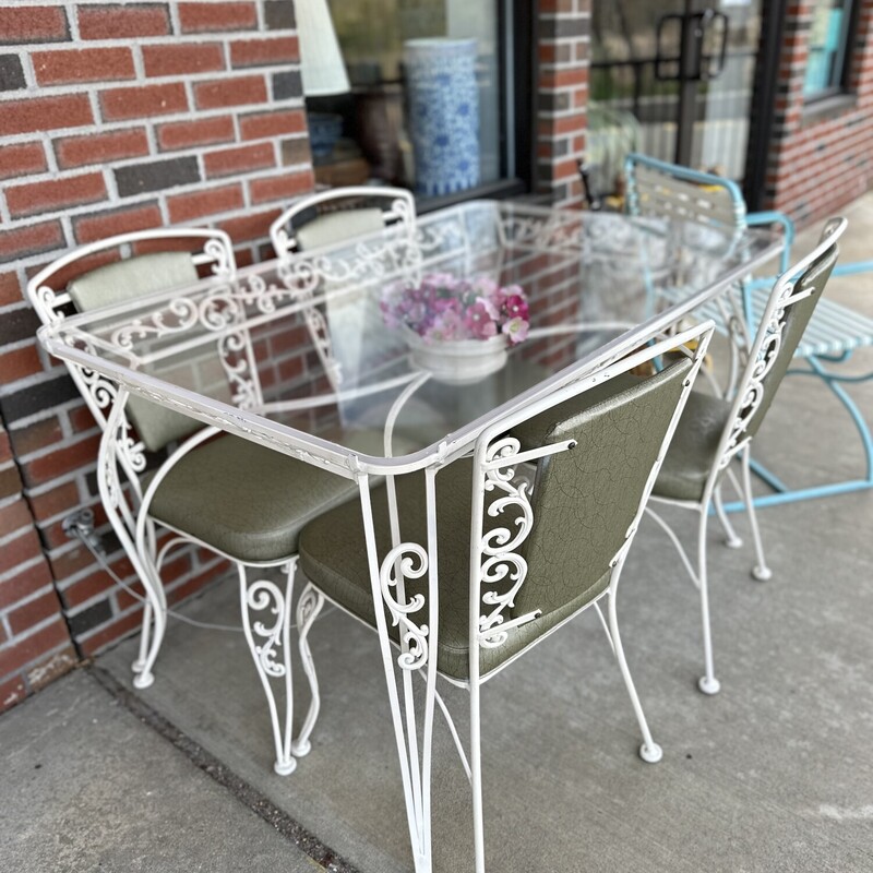 Salterini Patio Dining Set, White Iron with Plexiglass Surface. includes the table and 4 chairs.
Size: 48x32