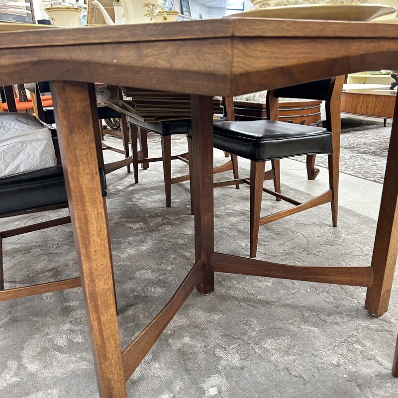 Stunning Mid-Century Modern Dining Table Set, in gorgeous condition. Includes the 48in hexagonal table, three 15in leaves, and six chairs. Stunning set!