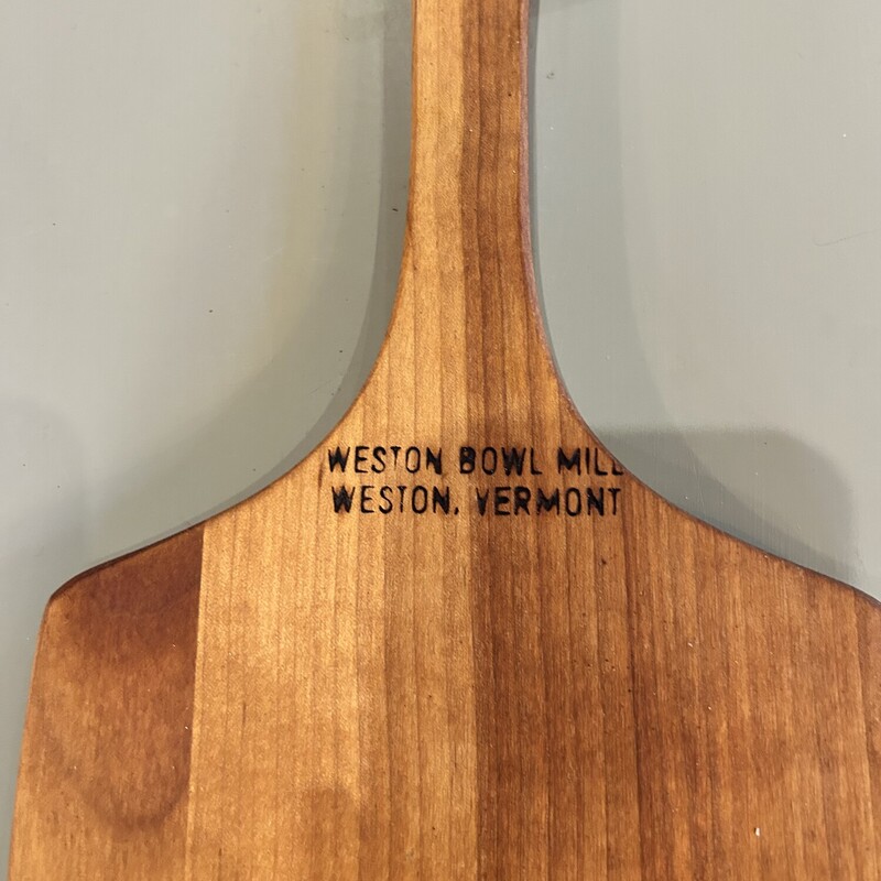 Weston Bowl Cutting Board,<br />
Size: 22 X 6<br />
Weston Bowl Mill in Weston Vermont<br />
This board has been branded with a bear, a leather strap has been attached and reconditioned with mineral oil  Already for your charcuterie delights!!