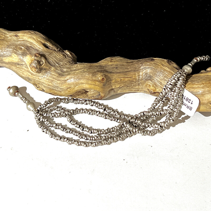 Bracelet, Multi Strand Silver Tone beads.