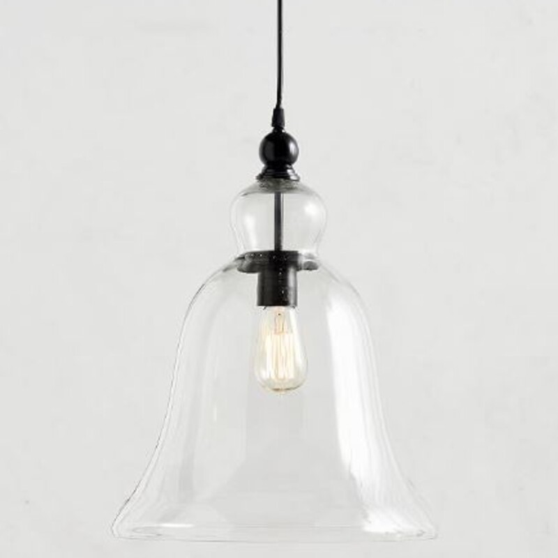 Pottery Barn Rustic Large Glass Pendant
Clear Black Size: 13.5 x 17H
BRAND NEW - original box included
Retails: $299+

CONSTRUCTION
Made of glass on an iron frame with a hand applied Distressed Black finish.
Adjustable height, ideal ceiling height 8’.
Compatible with dimmer switch.
Damp UL-listed for use indoors or in a protected outdoor area.
Light bulb(s) are not included. Accommodates one 60W type A standard bulb or LED equivalent.
Imported.
CARE
To protect finish, do not apply abrasives or household cleaners, dust with soft dry cloth.
Do not exceed specified wattage.
Outdoor damp rated fixtures can only be used in covered, fully protected locations that are not directly exposed to water, even during storms. Outdoor Damp Locations include covered patios and covered porches that are fully protected from water, even during storms.
ASSEMBLY
Hardwired; professional installation recommended.
Not compatible with mounting on slanted or sloped ceiling.