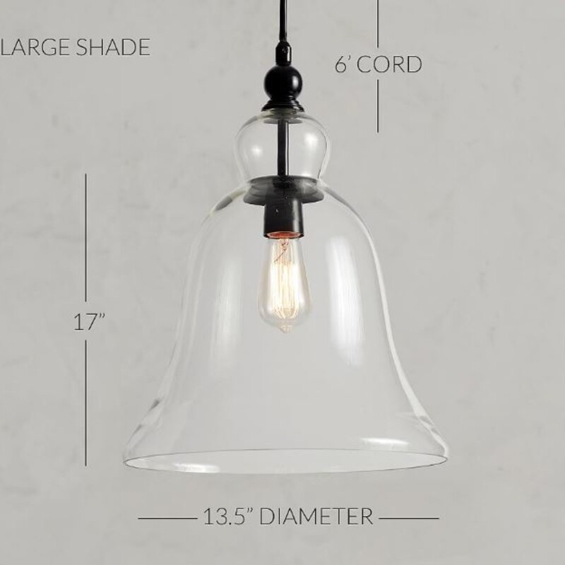 Pottery Barn Rustic Large Glass Pendant<br />
Clear Black Size: 13.5 x 17H<br />
BRAND NEW - original box included<br />
Retails: $299+<br />
<br />
CONSTRUCTION<br />
Made of glass on an iron frame with a hand applied Distressed Black finish.<br />
Adjustable height, ideal ceiling height 8’.<br />
Compatible with dimmer switch.<br />
Damp UL-listed for use indoors or in a protected outdoor area.<br />
Light bulb(s) are not included. Accommodates one 60W type A standard bulb or LED equivalent.<br />
Imported.<br />
CARE<br />
To protect finish, do not apply abrasives or household cleaners, dust with soft dry cloth.<br />
Do not exceed specified wattage.<br />
Outdoor damp rated fixtures can only be used in covered, fully protected locations that are not directly exposed to water, even during storms. Outdoor Damp Locations include covered patios and covered porches that are fully protected from water, even during storms.<br />
ASSEMBLY<br />
Hardwired; professional installation recommended.<br />
Not compatible with mounting on slanted or sloped ceiling.